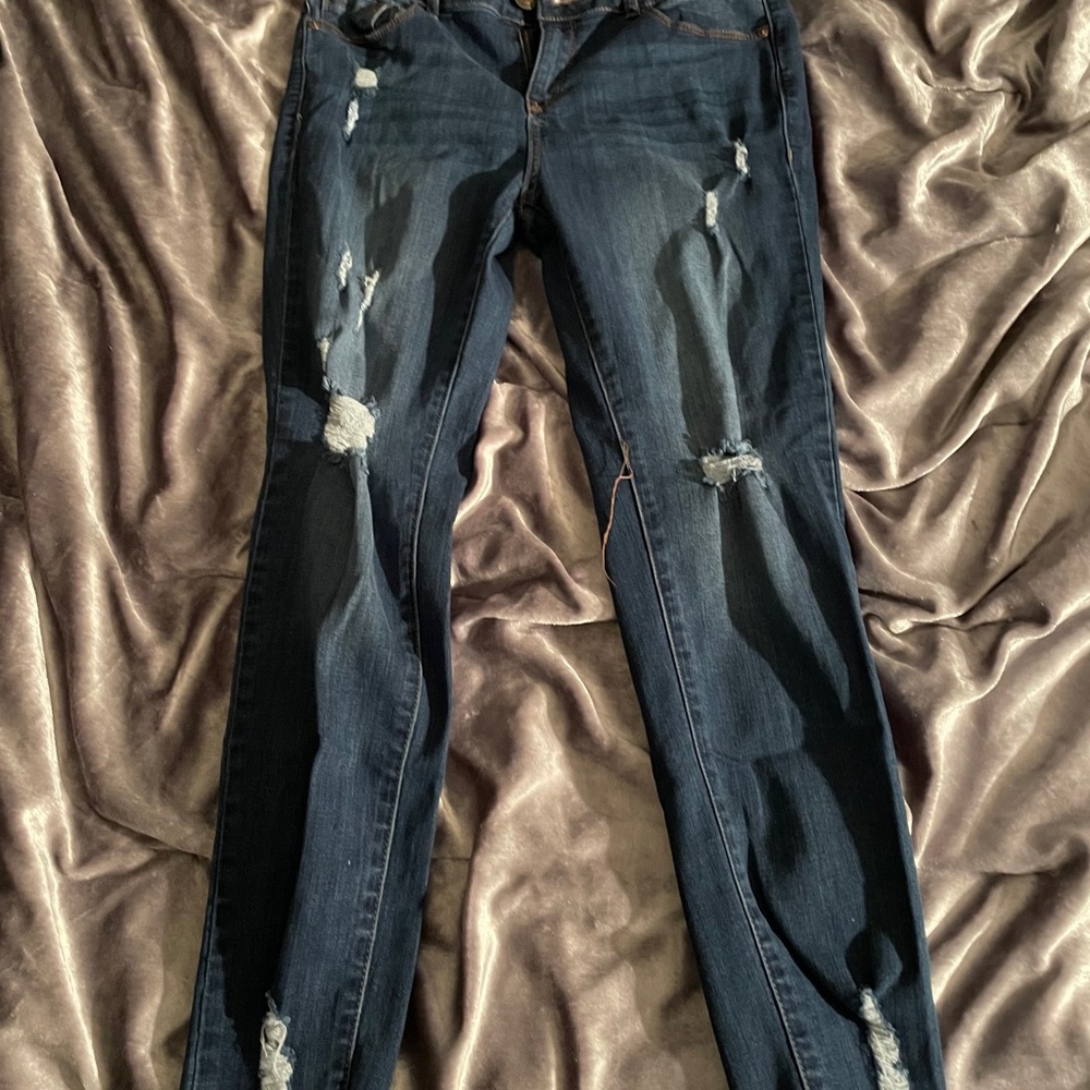 Blue distressed jeans
